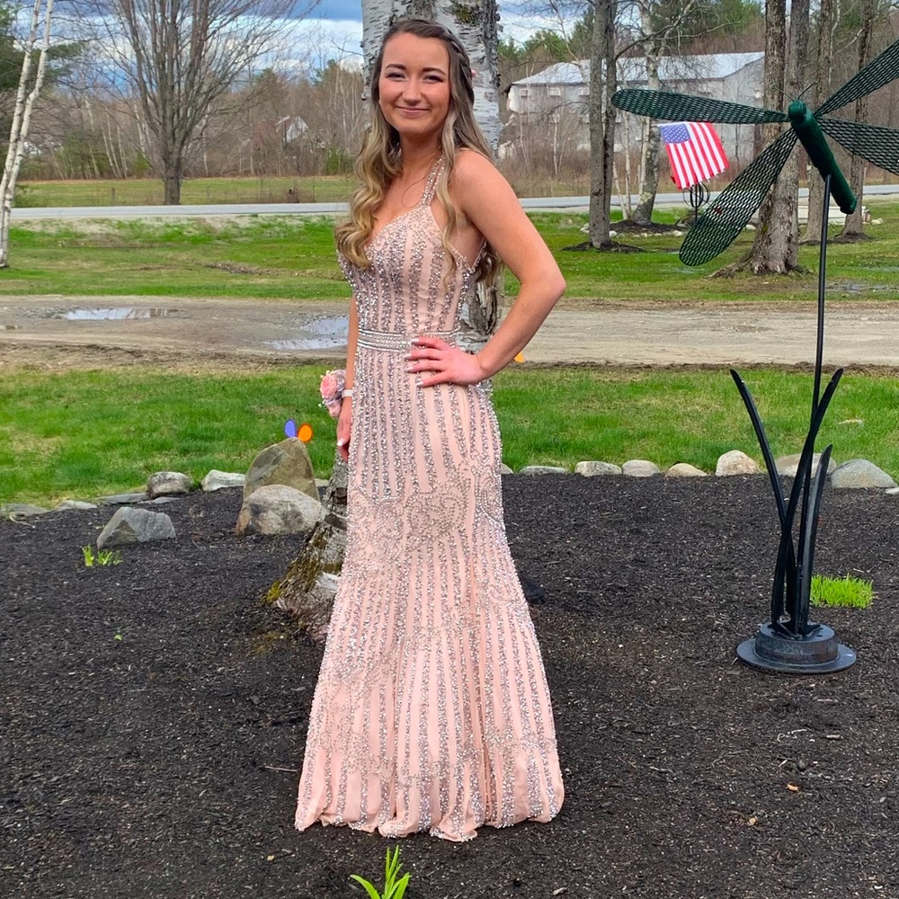 Selling my prom dress, only worn once. Hoping someone else can find joy in it!